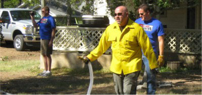 Bastrop, Texas: Treating threatened homes with donated Environx products.